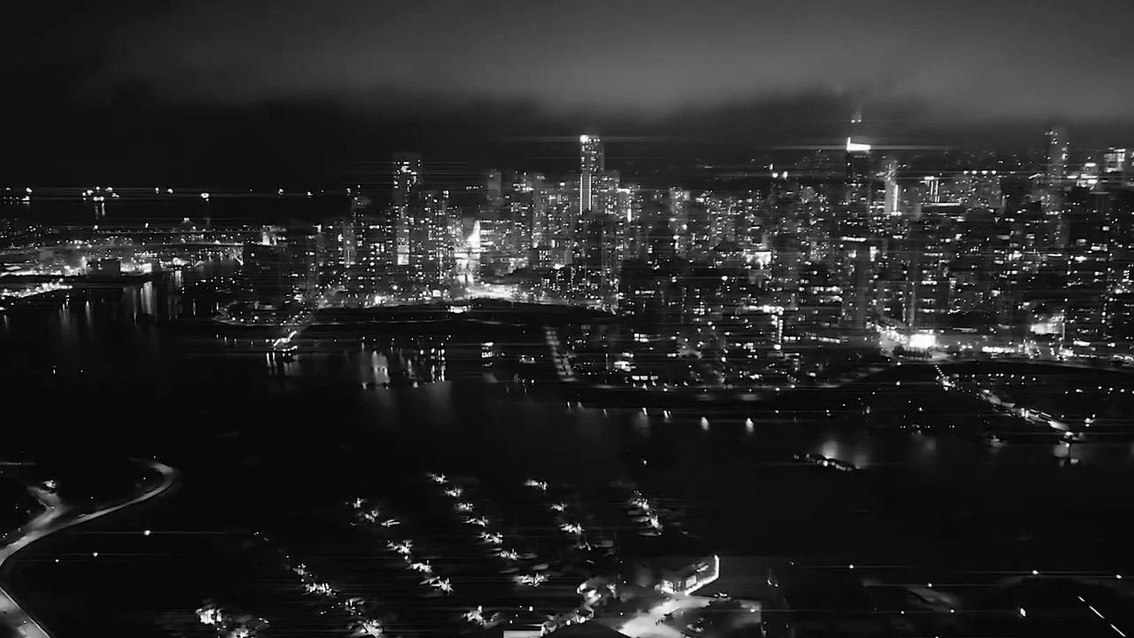The Vancouver skyline at night, seen from above the water
